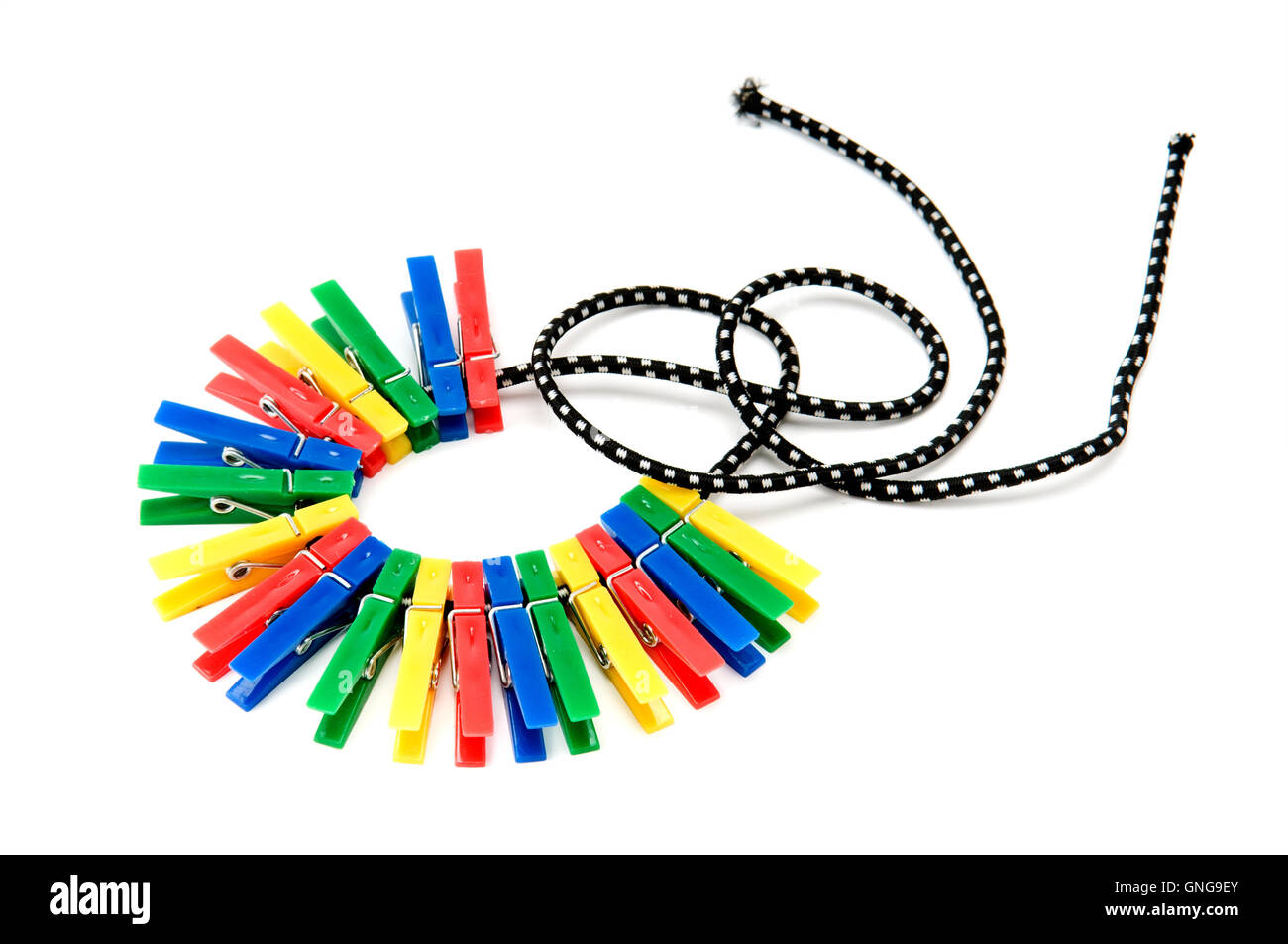 clothespins on a rope isolated on white background Stock Photo Alamy