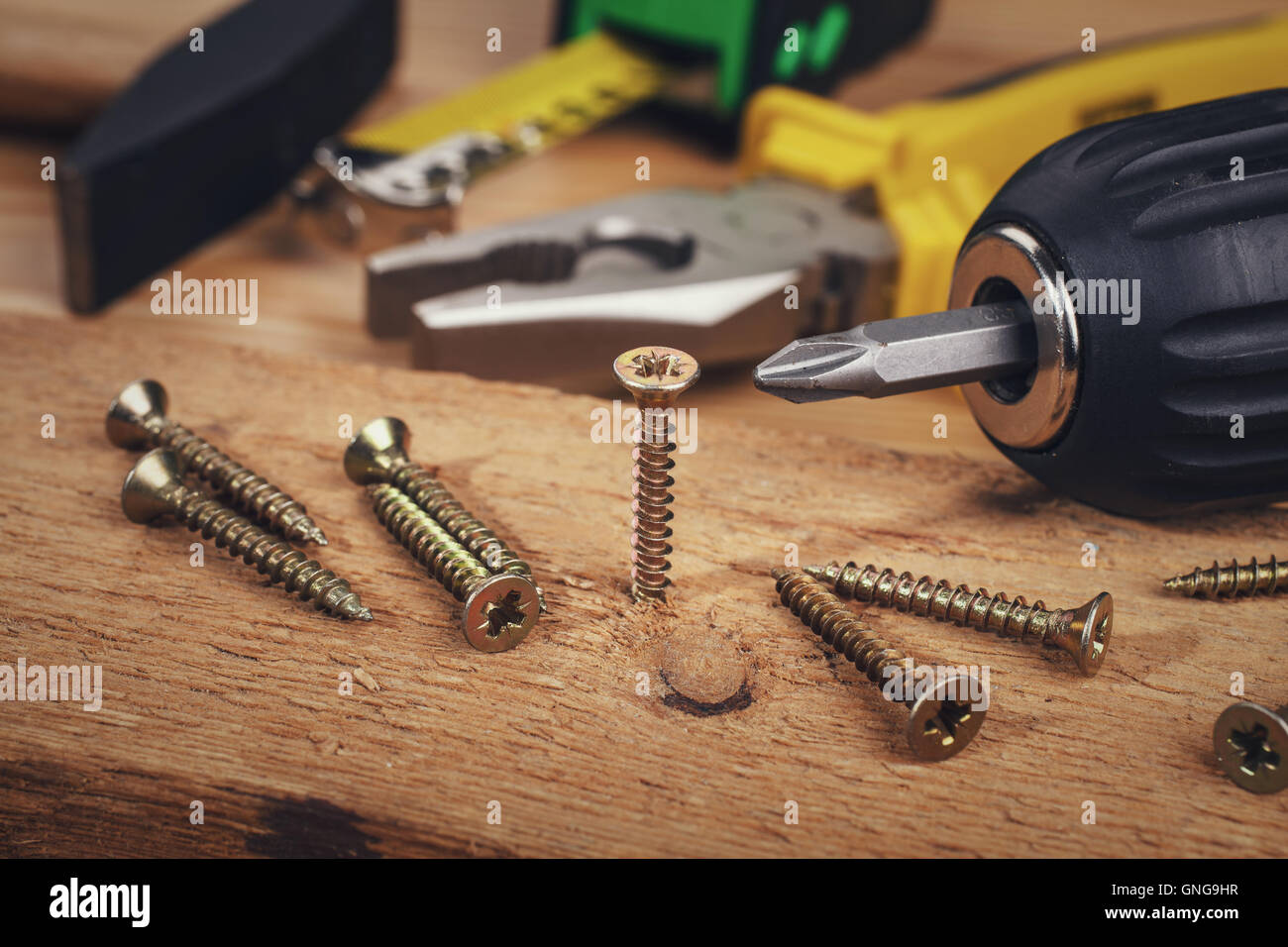 Wood screws and carpentry tools Stock Photo