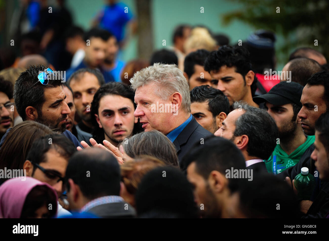 Dieter Reiter visits the refugee accommodation center in the Bayern Kaserne in Munich, 2014 Stock Photo
