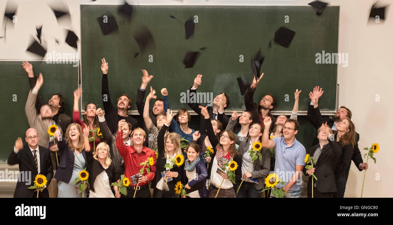 PhD students celebrating their graduation from the TUM in Freising, 2014 Stock Photo