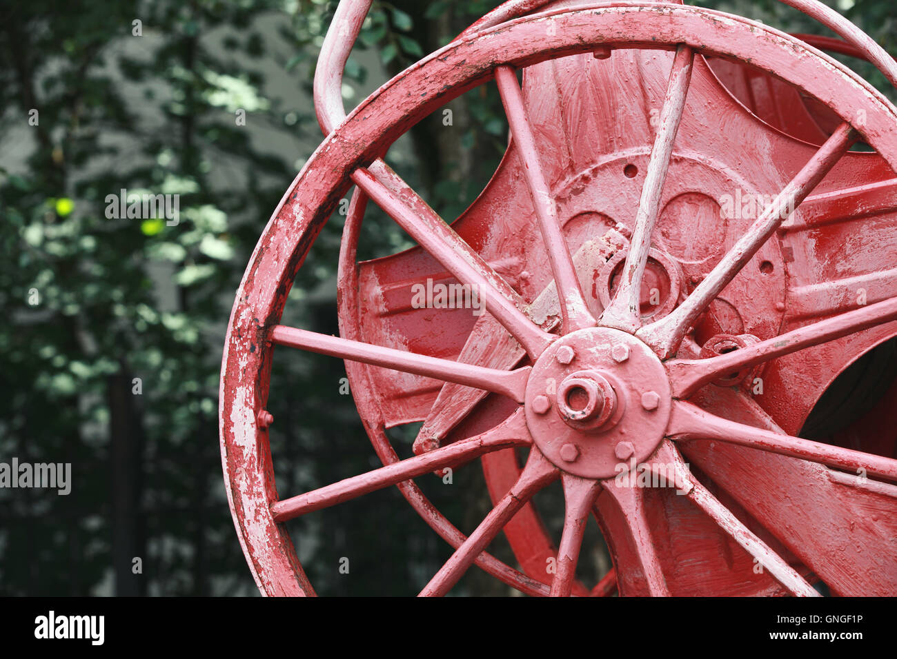 Red reel on vintage fire engine, closeup photo with selective focus Stock Photo