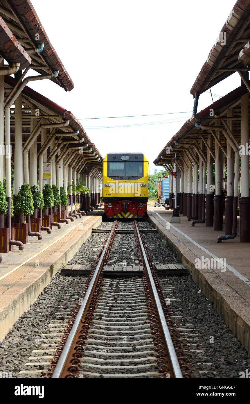 The train was parked in a railway station in Thailand. Stock Photo