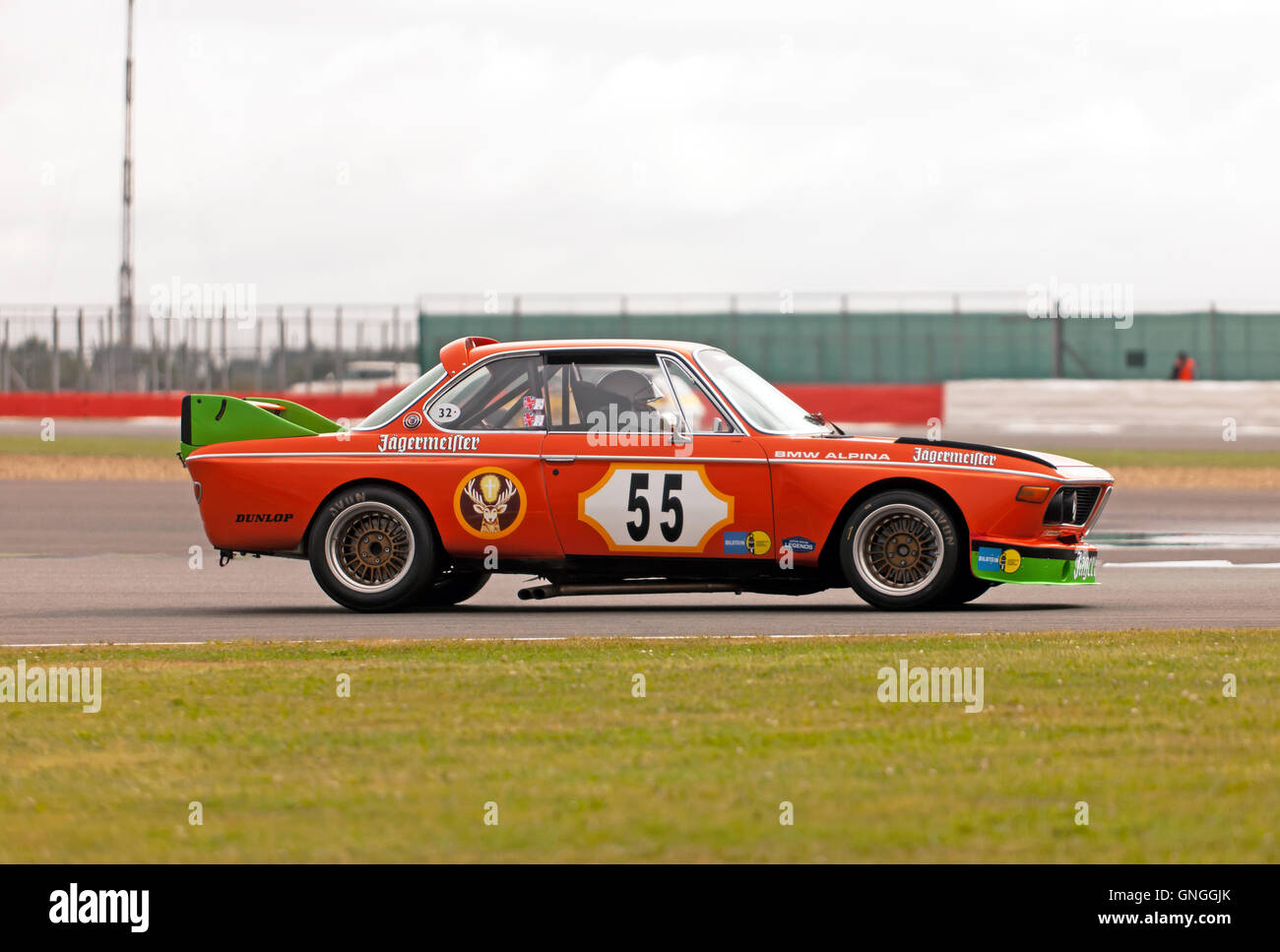 An 1975, Orange, BMW 3.0 CSL alpina driven by Peter Muller and Patrick Blakeney-Edwards during Silverstrone Class qualifying Stock Photo