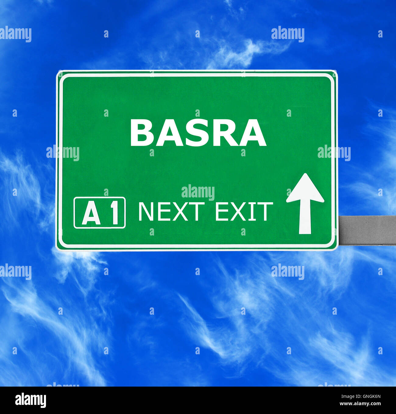 BASRA road sign against clear blue sky Stock Photo