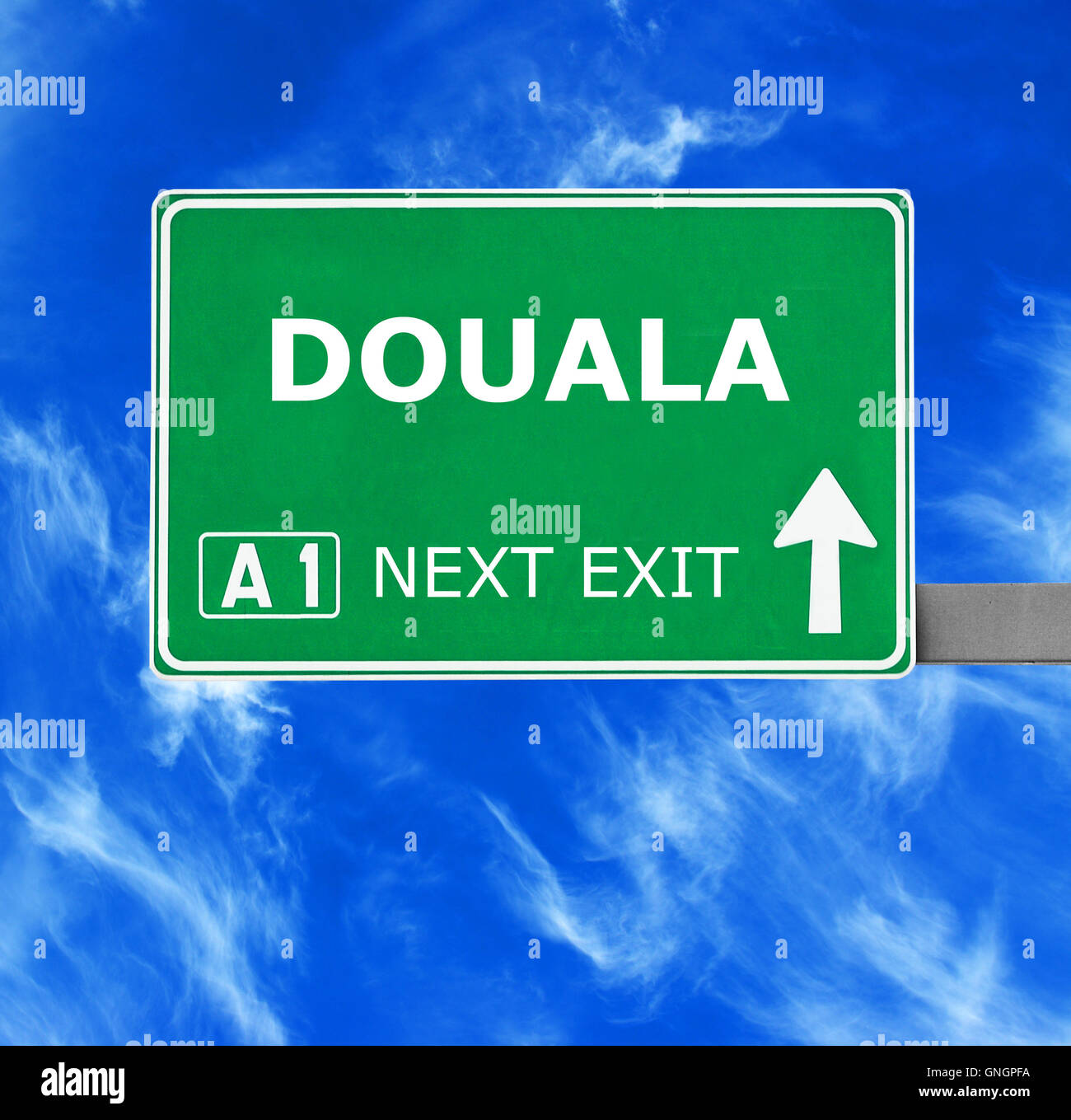 DOUALA road sign against clear blue sky Stock Photo