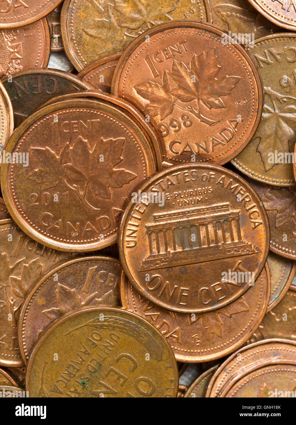 Canadian and American penny background, Canadian penny has been