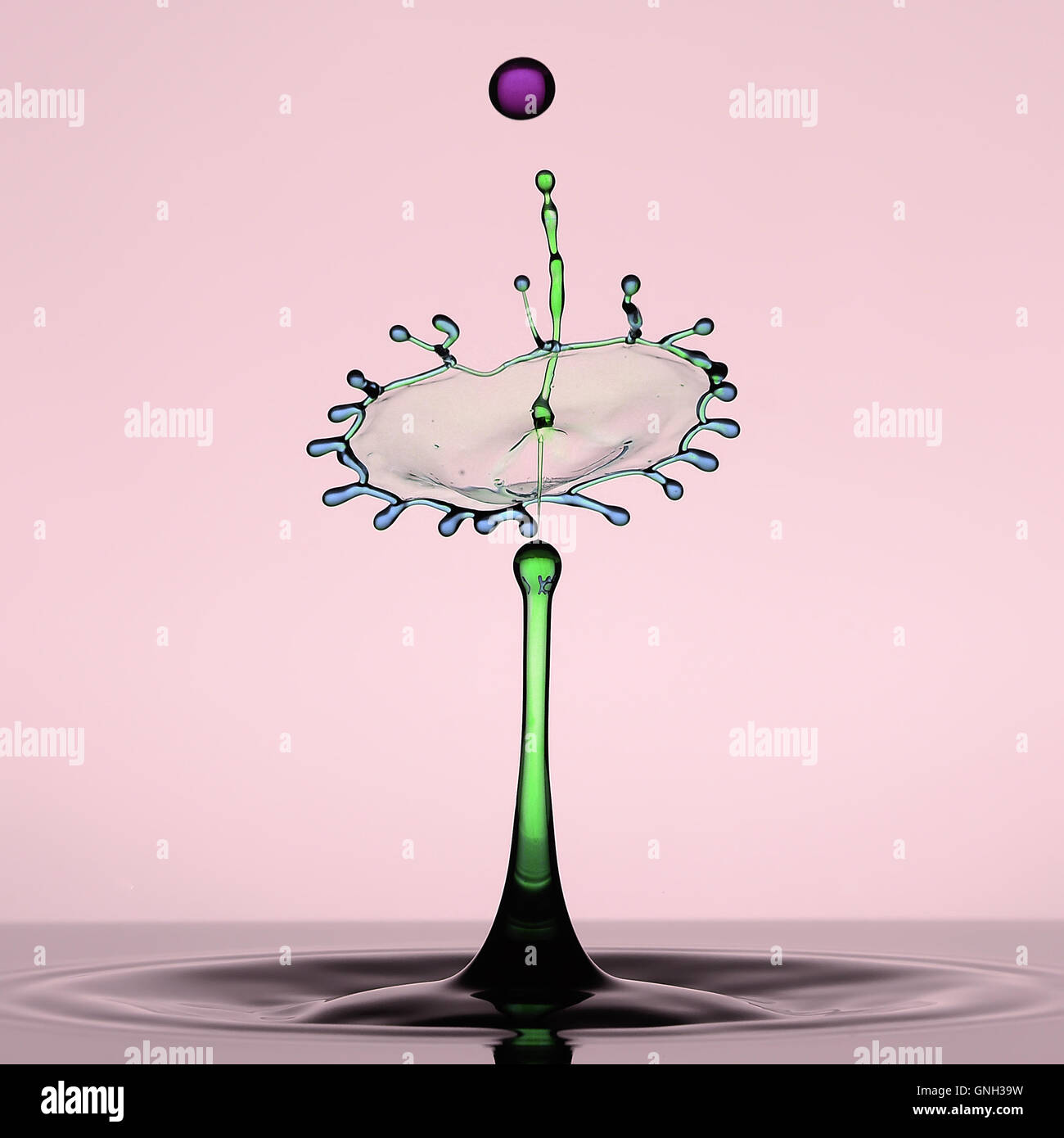 Multi-colored water droplet and splash crown Stock Photo