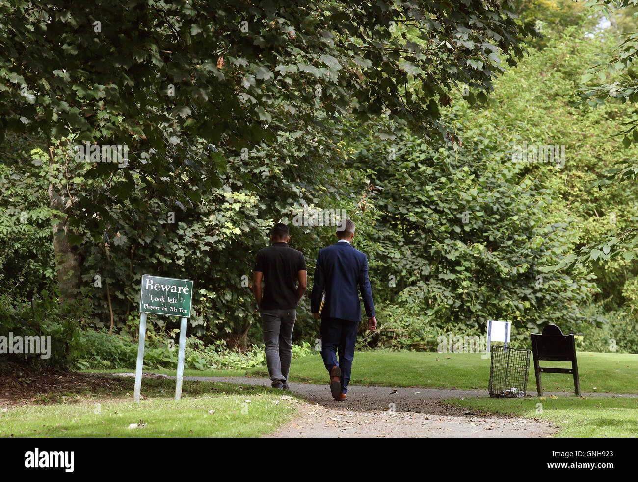 Head of crime operations for Edinburgh CID DCI Martin MacLean (right) with Sadat Ahmed, the brother of Saima Ahmed, near to the location where her body was found at Gogarburn Golf Club in Newbridge. Stock Photo
