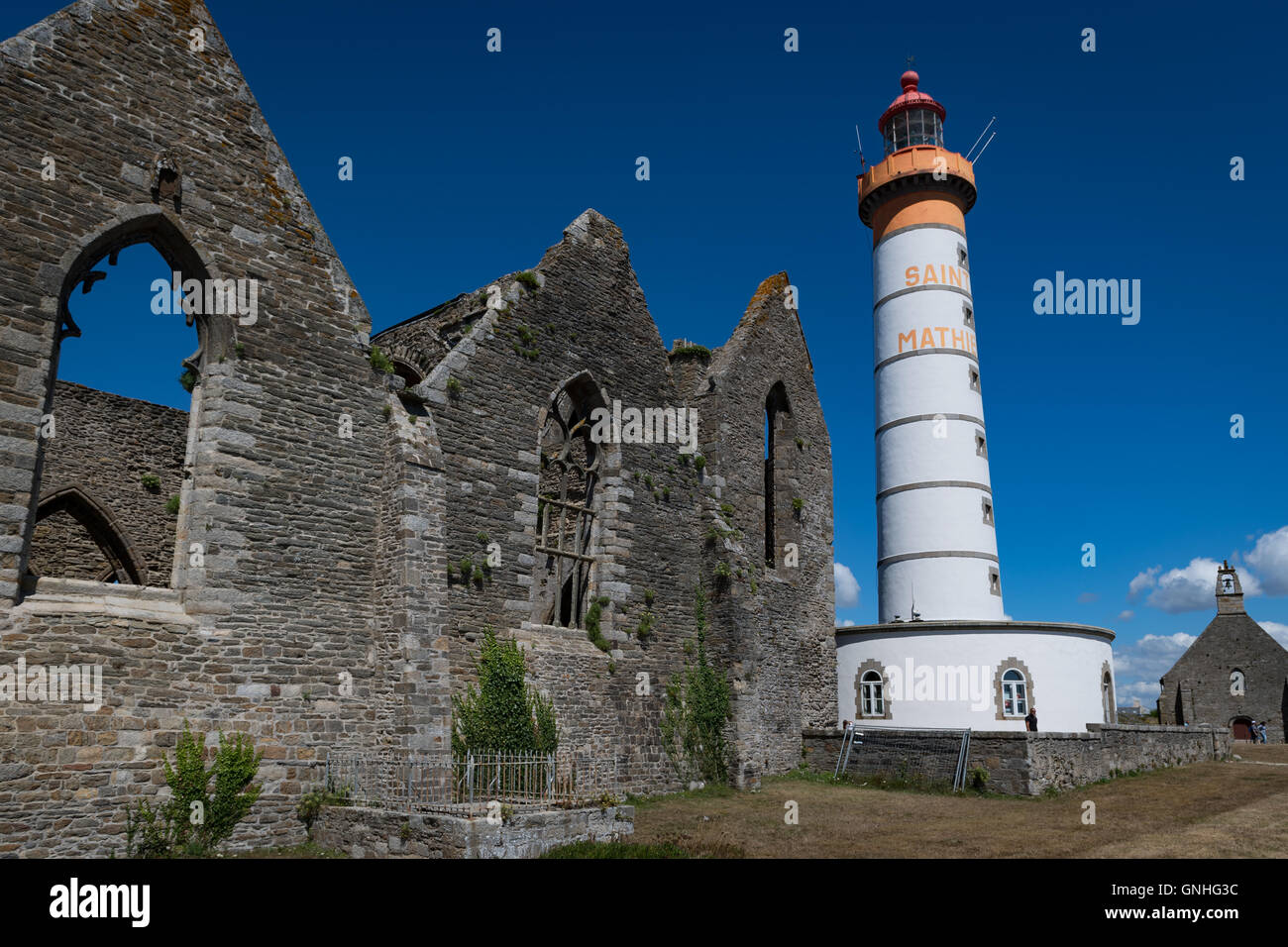 The abbey ruins and lighthouse at Pointe de St Mathieu, Brittany ...