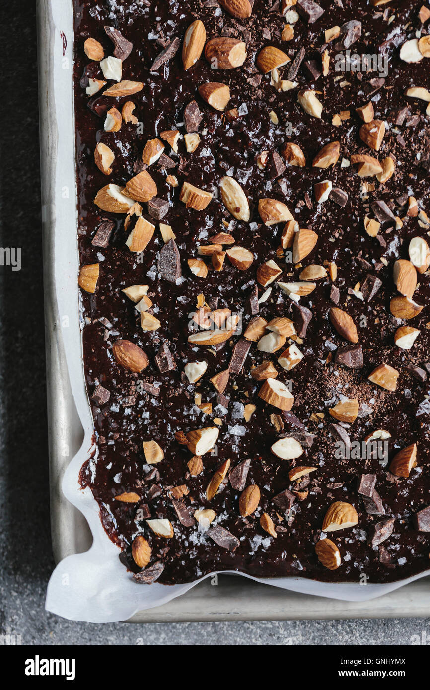 Dark Chocolate and Almond Butter Brownies with Sea Salt is photographed from the top view right after it was poured into the she Stock Photo