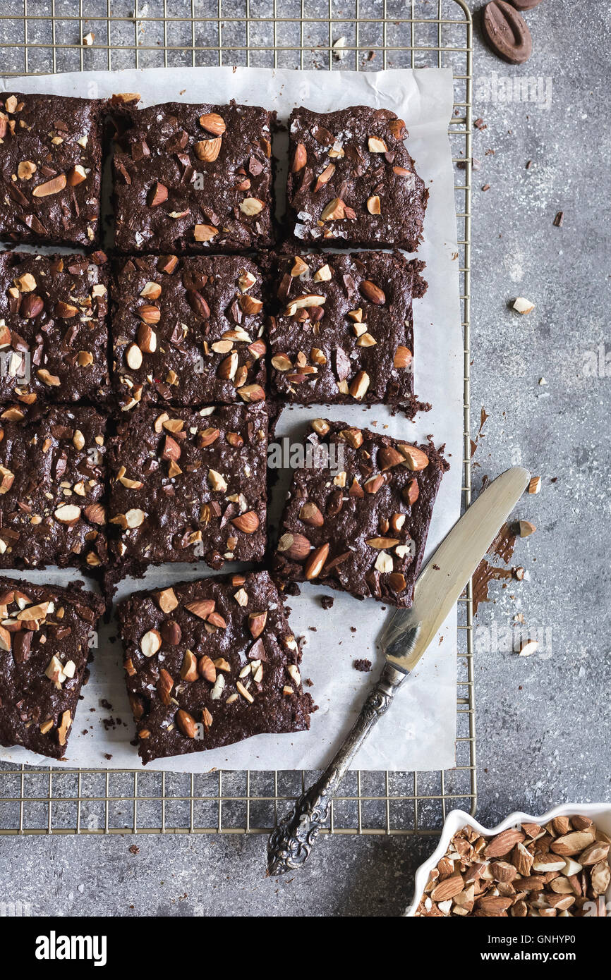 Dark Chocolate and Almond Butter Brownies with Sea Salt is photographed from the top view. Stock Photo