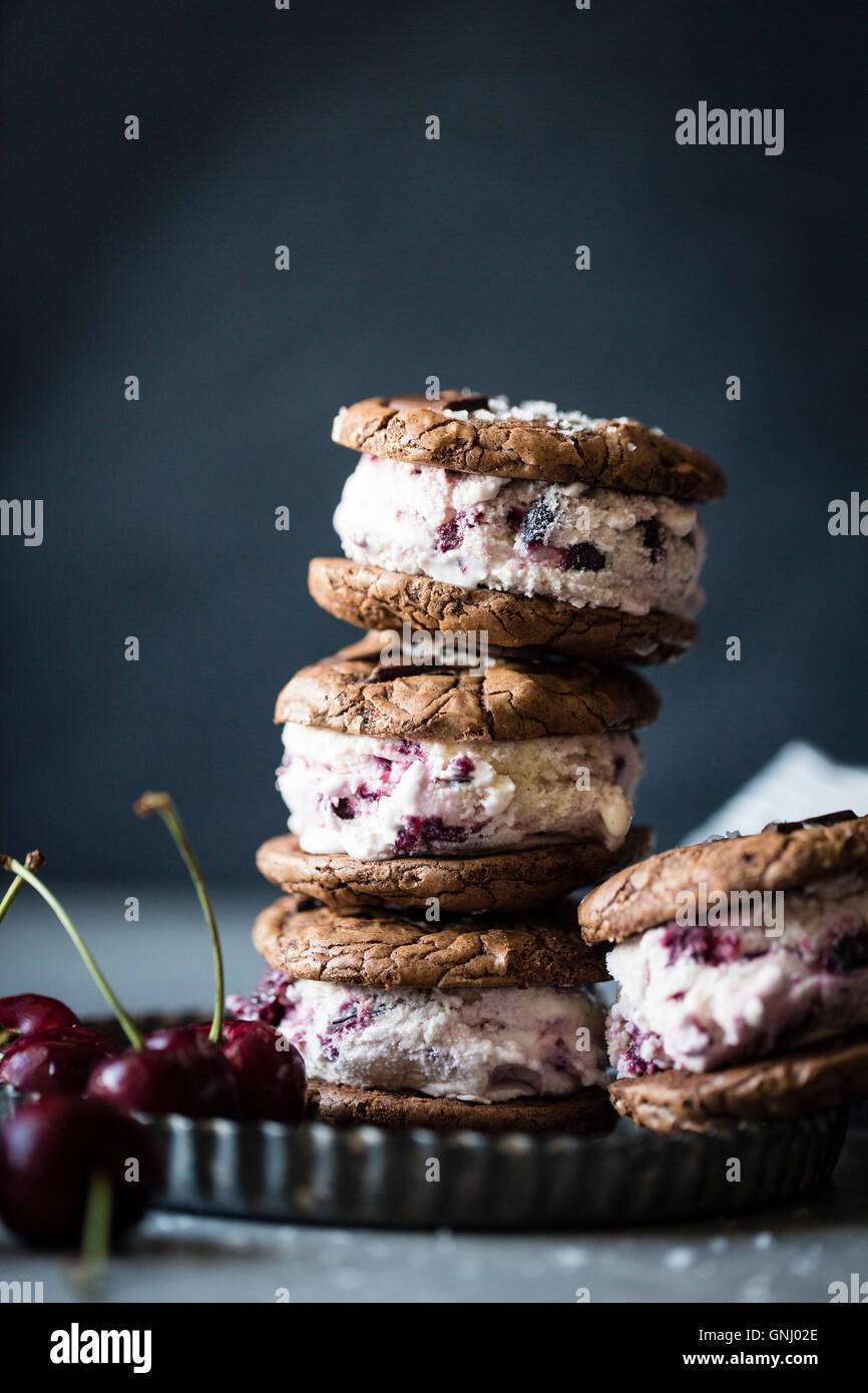 Roasted cherry ice cream sandwiches with salted double chocolate buckwheat cookies (gluten-free) Stock Photo
