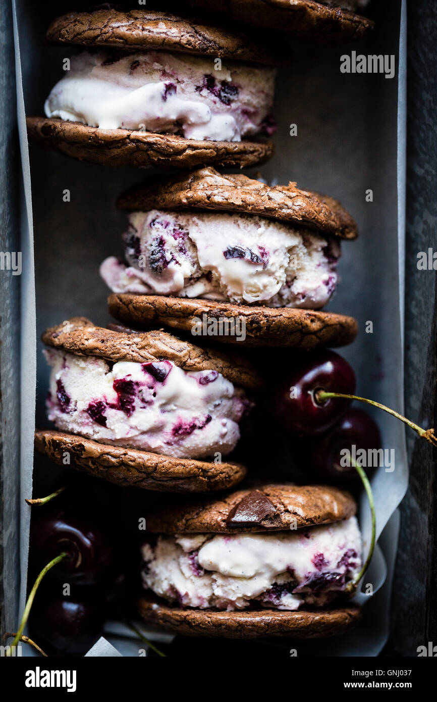 Roasted cherry ice cream sandwiches with salted double chocolate buckwheat cookies (gluten-free) Stock Photo