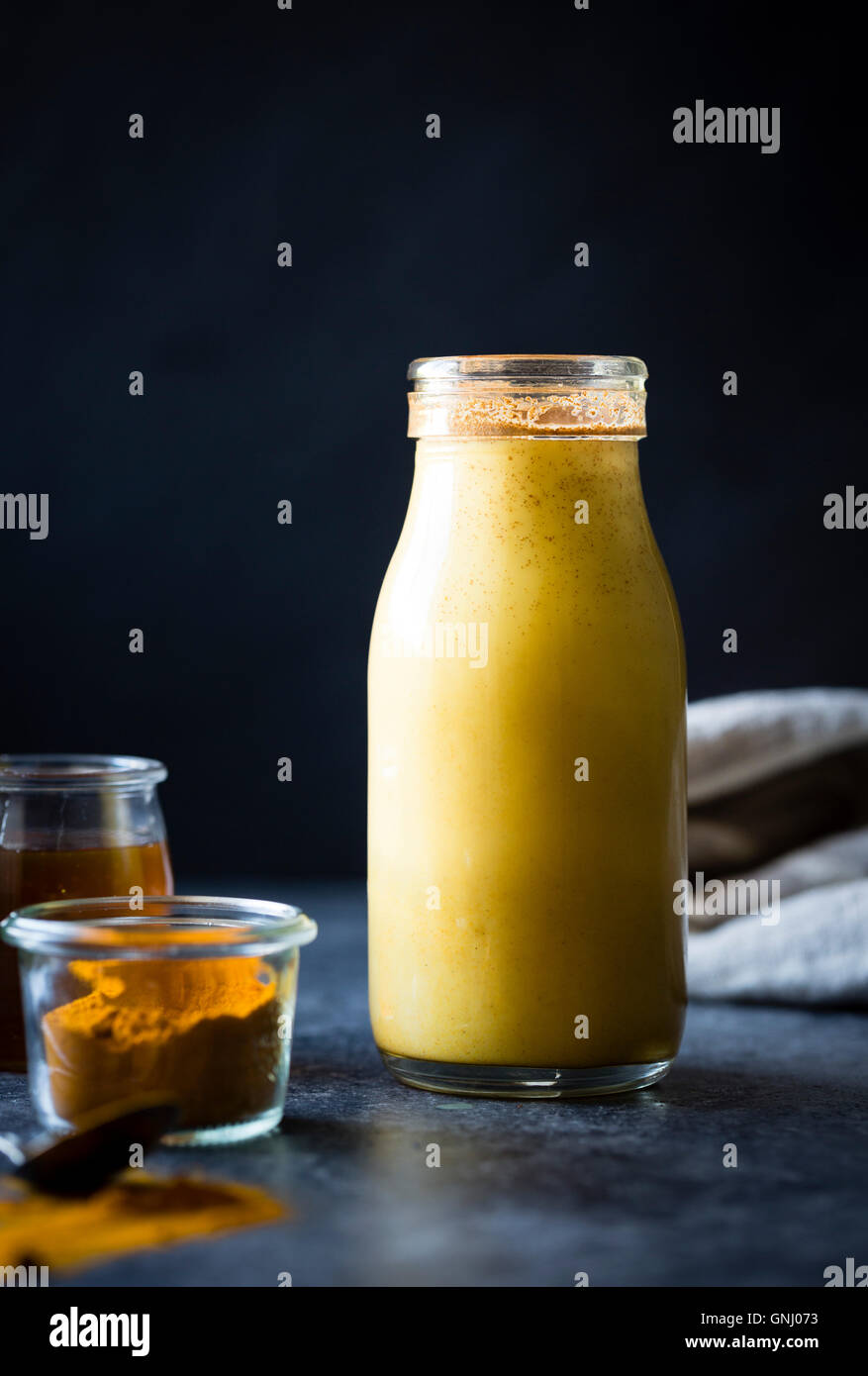 Golden Milk - Mixed honey, turmeric, ginger, cardamom, and cinnamon Stock Photo