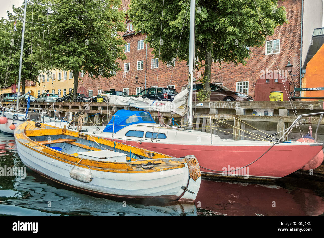 Boats Moored On A Canal Copenhagen Denmark Stock Photo