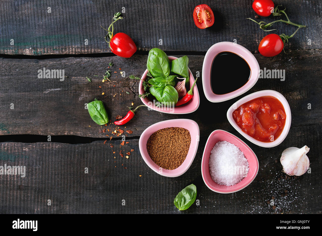 Ingredients for making homemade tomato ketchup sauce. Chopped tomatoes