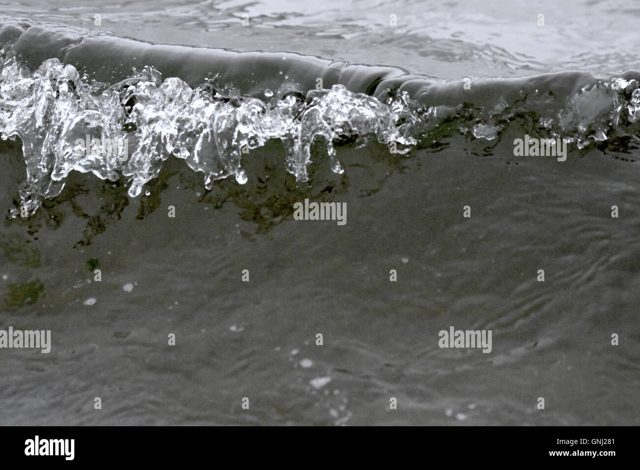 lapping waves in cornwall Stock Photo