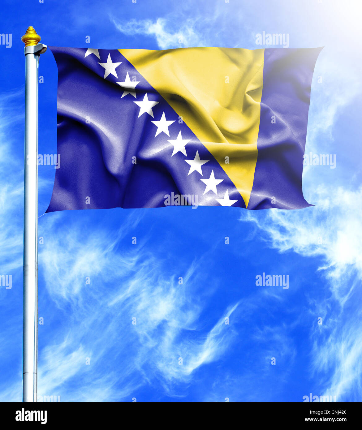 Blue sky and mast with hanged waving flag of Bosnia and Herzegovina ...
