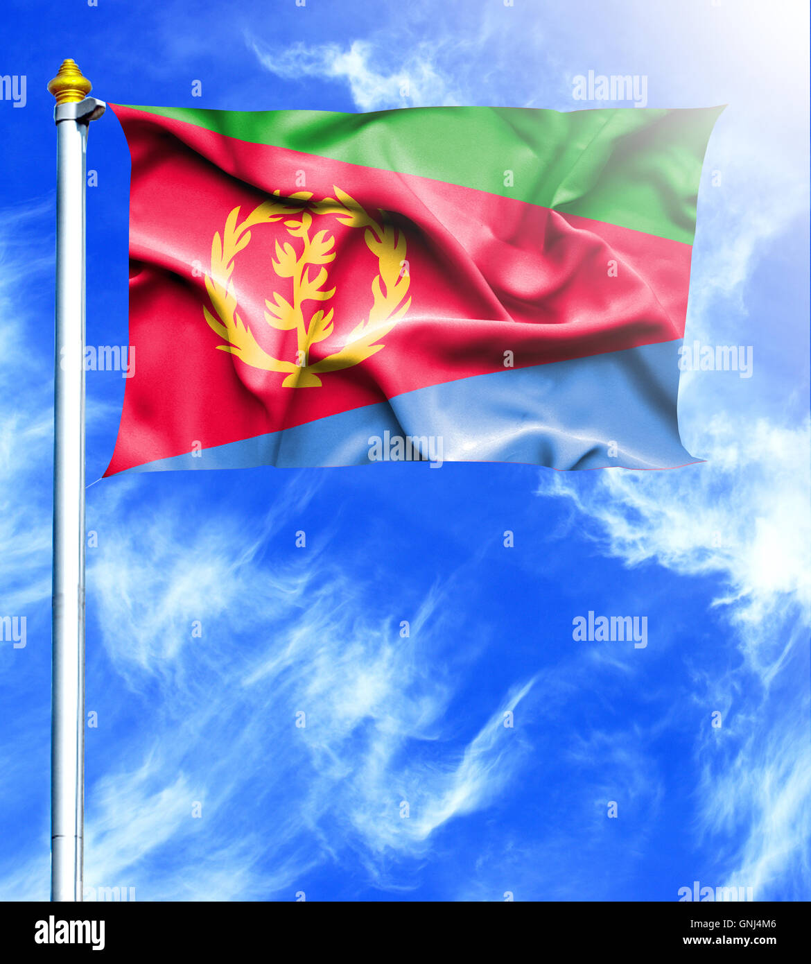 Blue sky and mast with hanged waving flag of Eritrea Stock Photo - Alamy