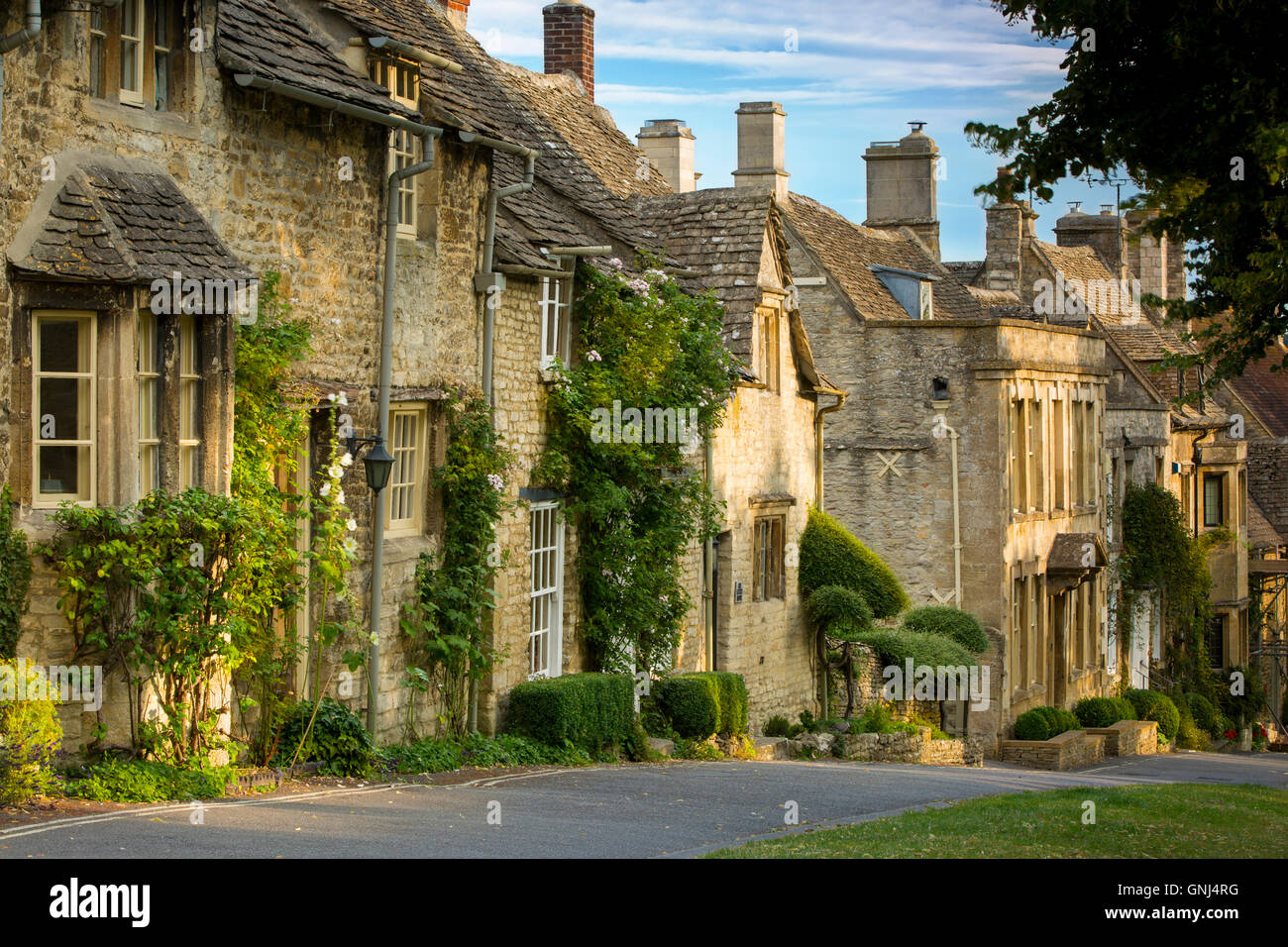 Early morning over connected cottages in Burford, the Cotswolds, Oxfordshire, England Stock Photo