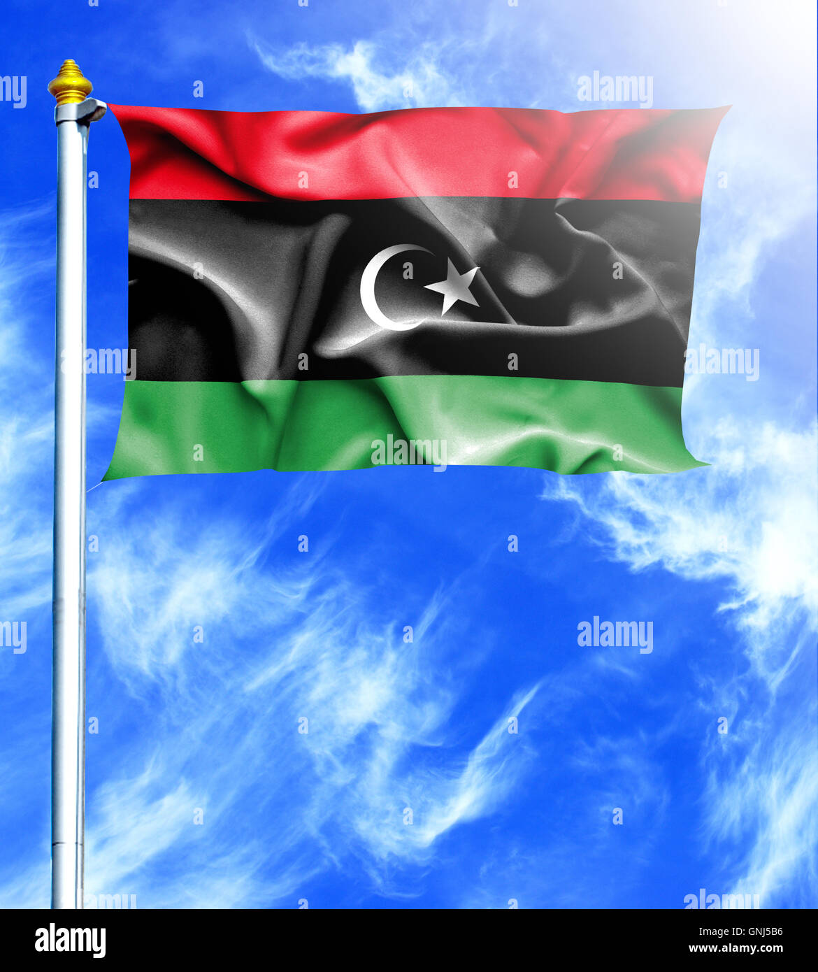 Blue sky and mast with hanged waving flag of Libya Stock Photo - Alamy