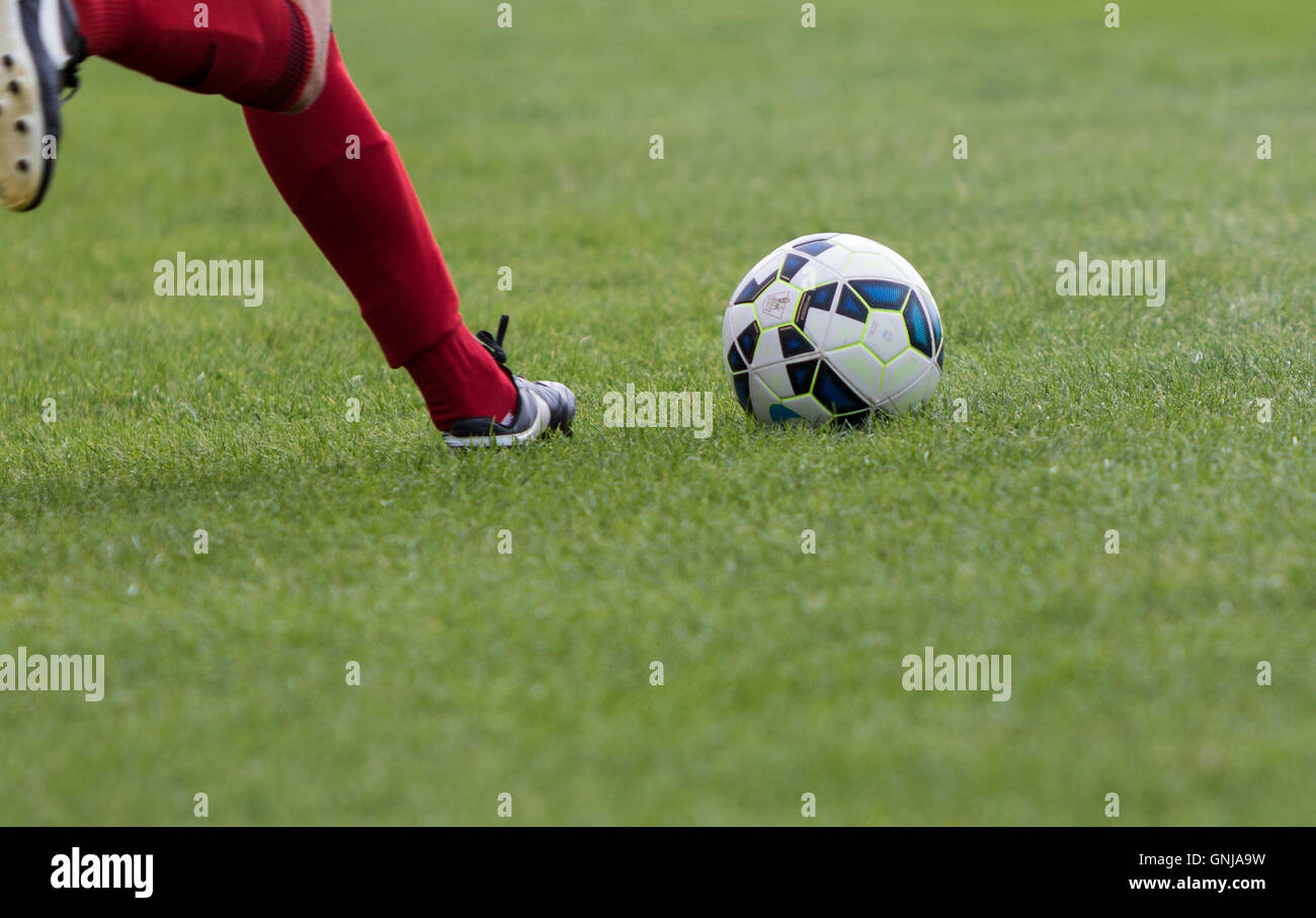Kicking football hires stock photography and images Alamy