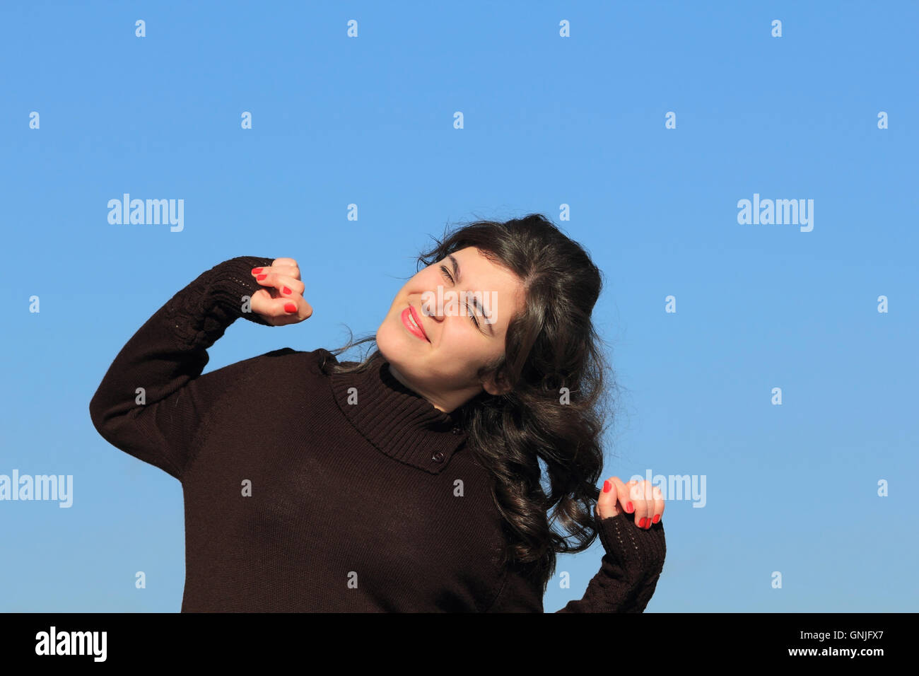 Woman stretching arms outdoors hi-res stock photography and images - Alamy