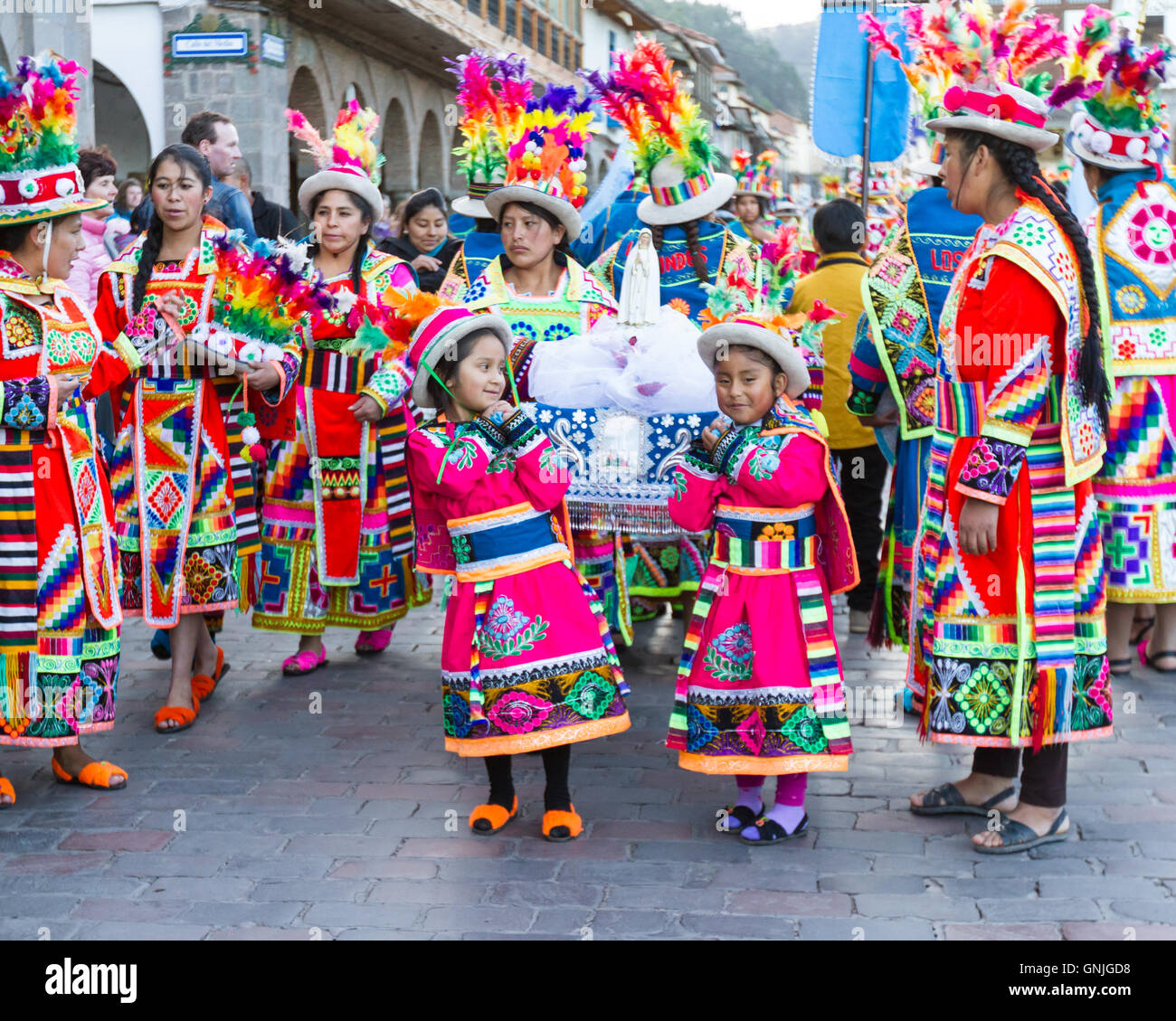 Cusco, Peru - May 13: Native people of Cusco dressed in colorful clothing in a religious celebration for Nuestra Señora de Fatim Stock Photo