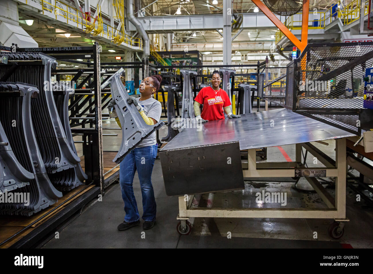 Sterling Heights, Michigan - Workers stack auto parts at Fiat Chrysler Automobiles' Sterling Stamping Plant. Stock Photo