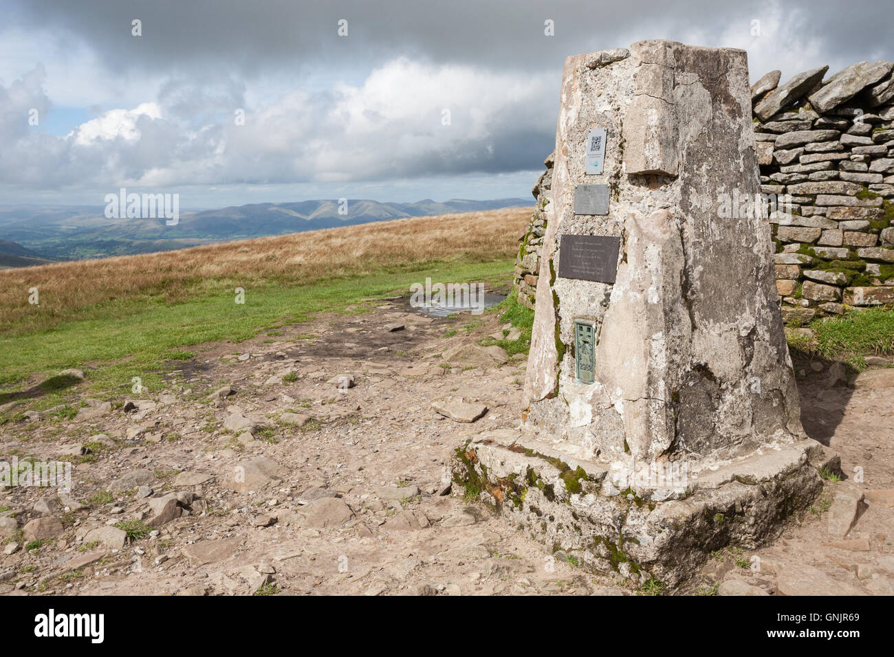 Trig point on top or Whernside, Yorkshire Dales National Park Stock Photo