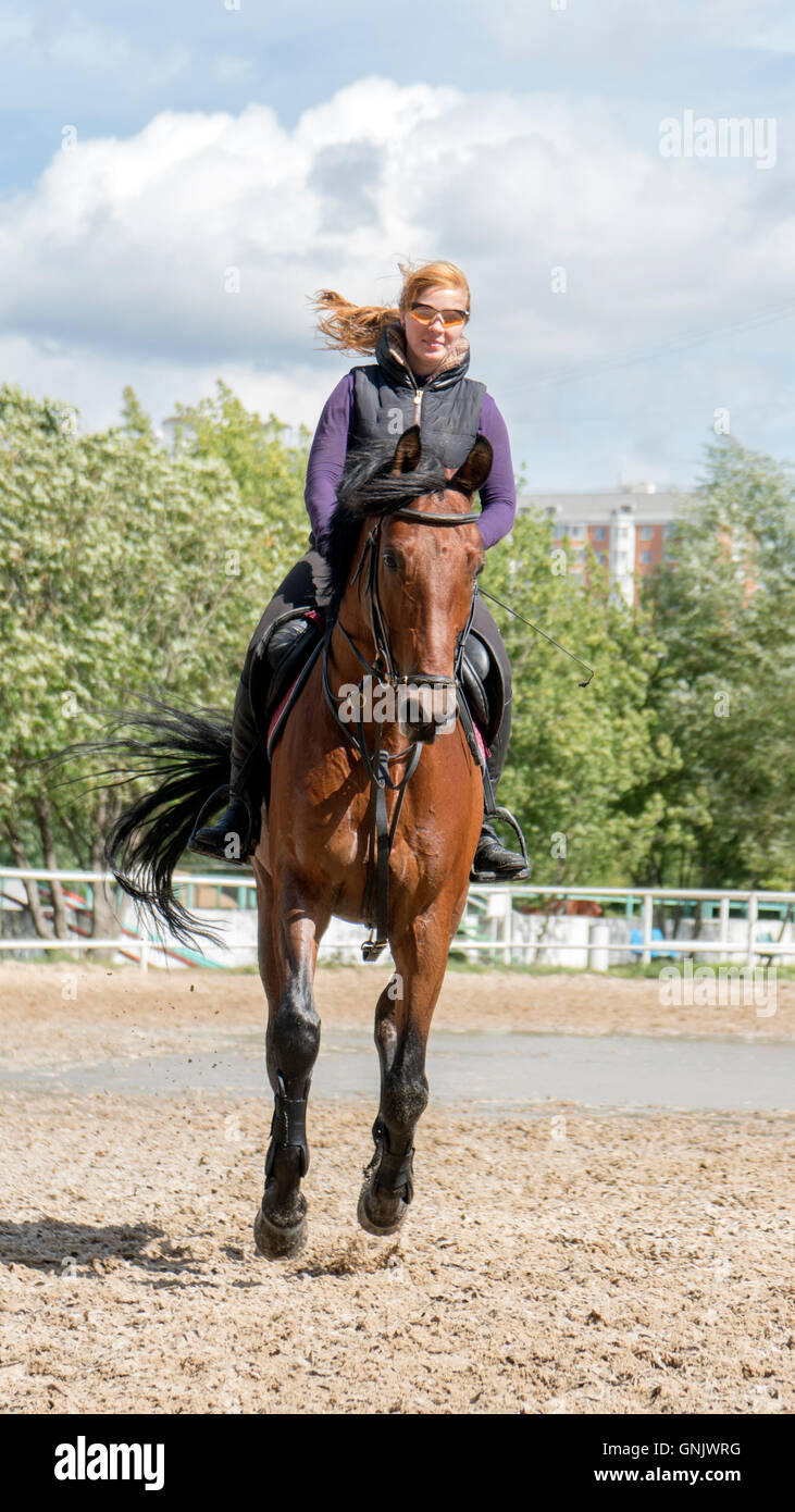 Girl riding horse jockey hi-res stock photography and images - Alamy