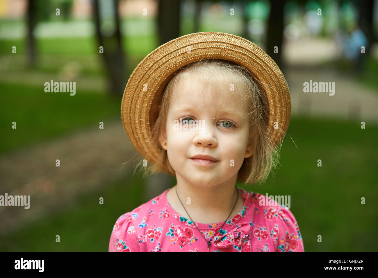 Cute kid girl wearing hat outdoors Stock Photo Alamy