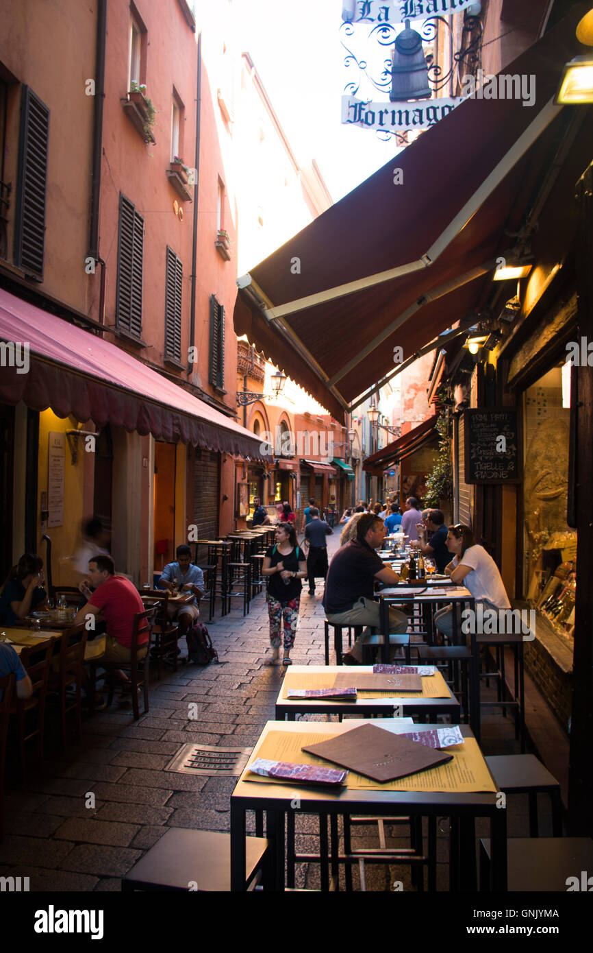 BOLOGNA, ITALY JULY 2016 Street with typical restaurants and people