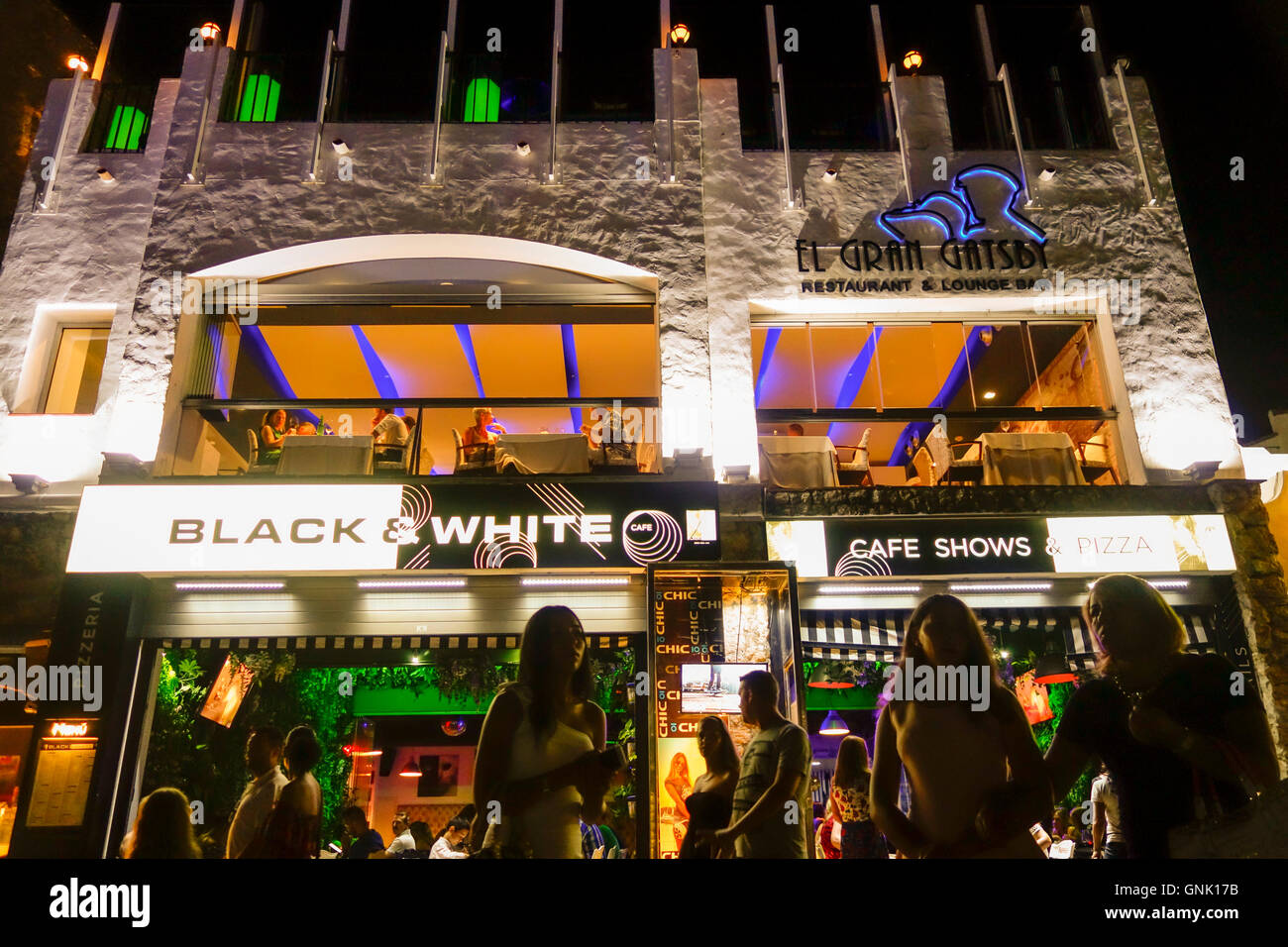 Black & white bar, cafe at night, nightlife, Marina Puerto Banus, Marbella,  Spain Stock Photo - Alamy