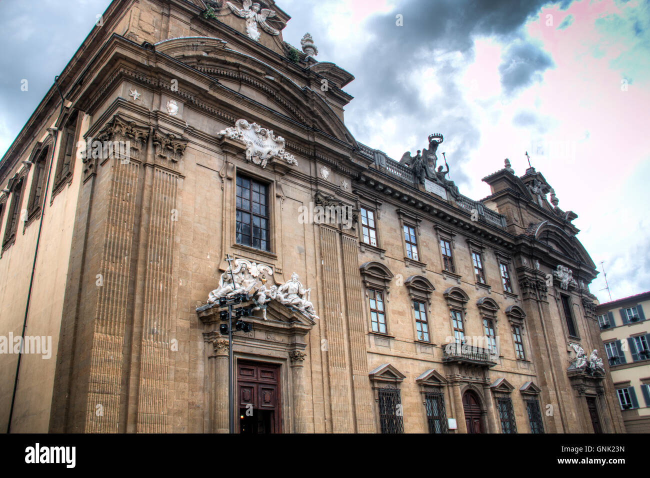 Facade of a historical building in Florence in Italy Stock Photo - Alamy