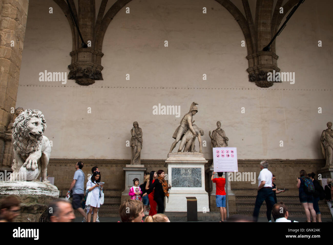 FLORENCE, ITALY JULY 2016 Several statues with people on the piazza
