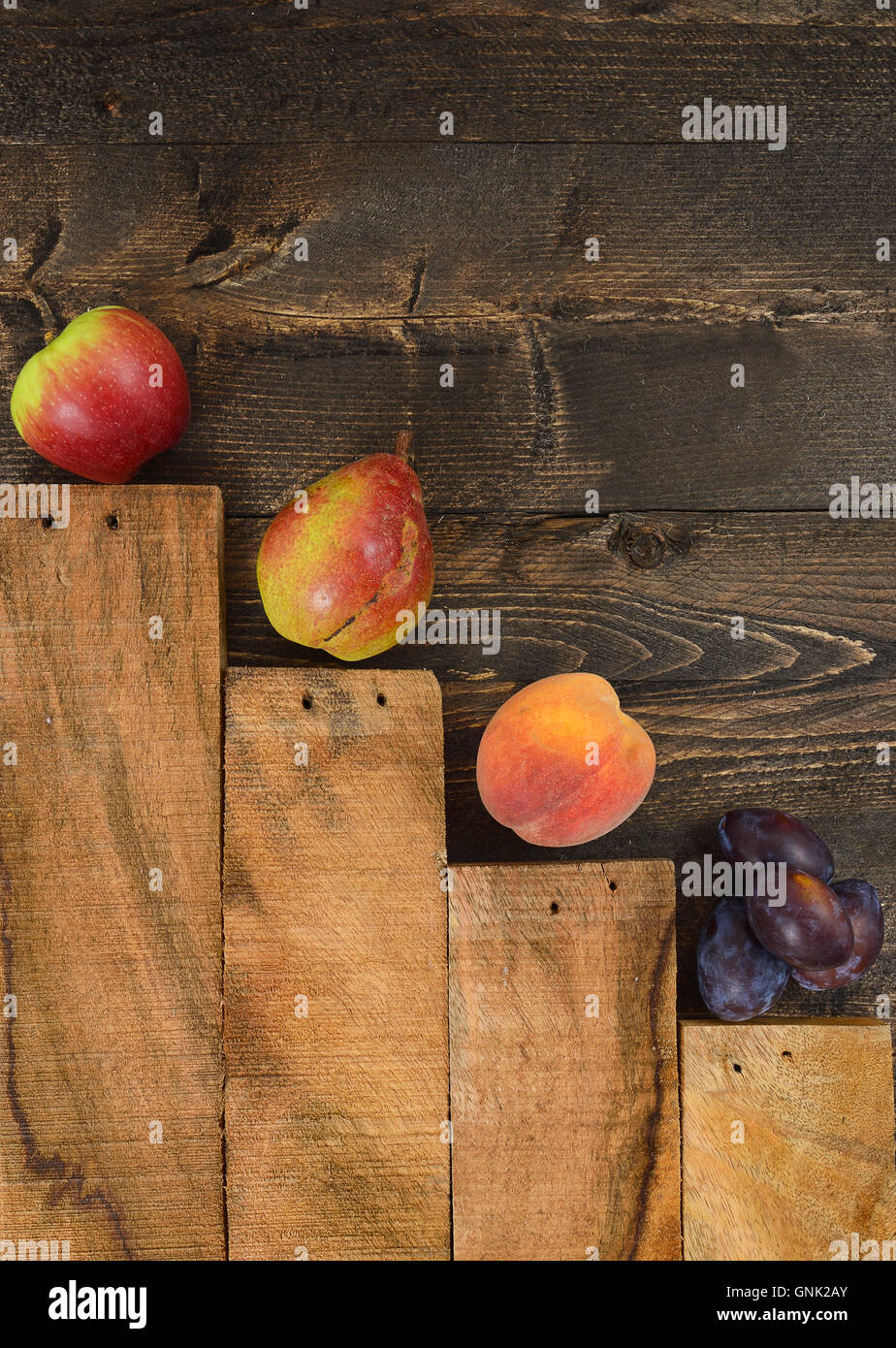 Assortment of fruits are on the rustic wooden table Stock Photo - Alamy