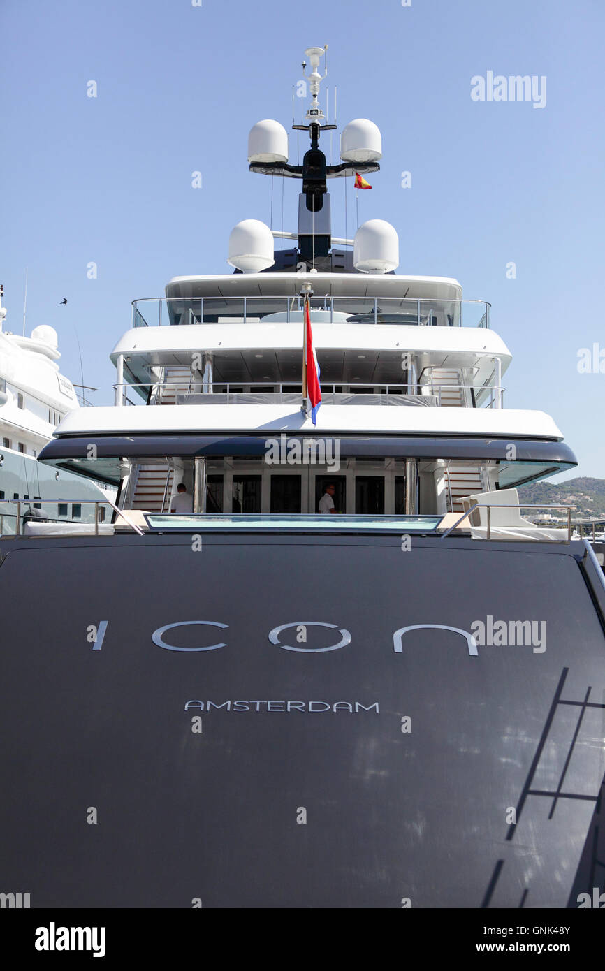 Luxury yacht ICON at moorings in the Port at Old Town Ibiza (Eivissa). Being prepared for their latest charter. Stock Photo