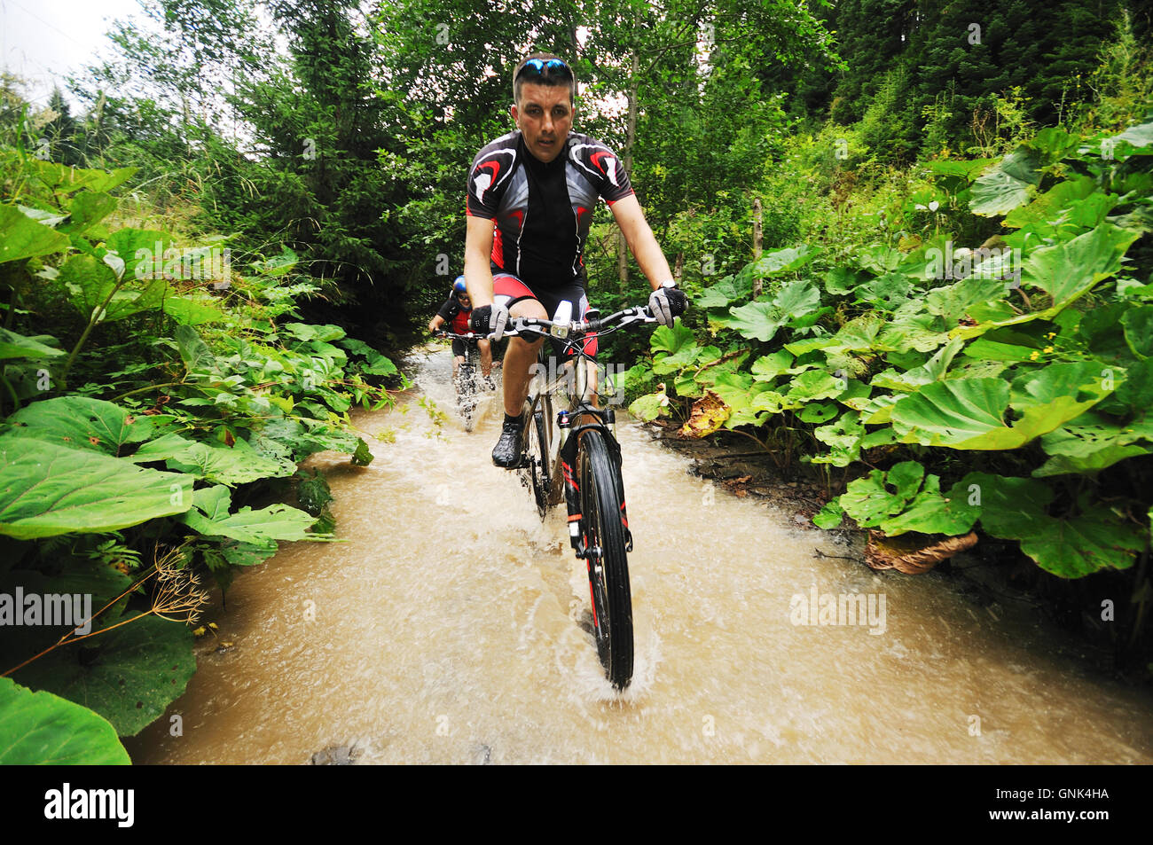 wet mount bike ride Stock Photo Alamy