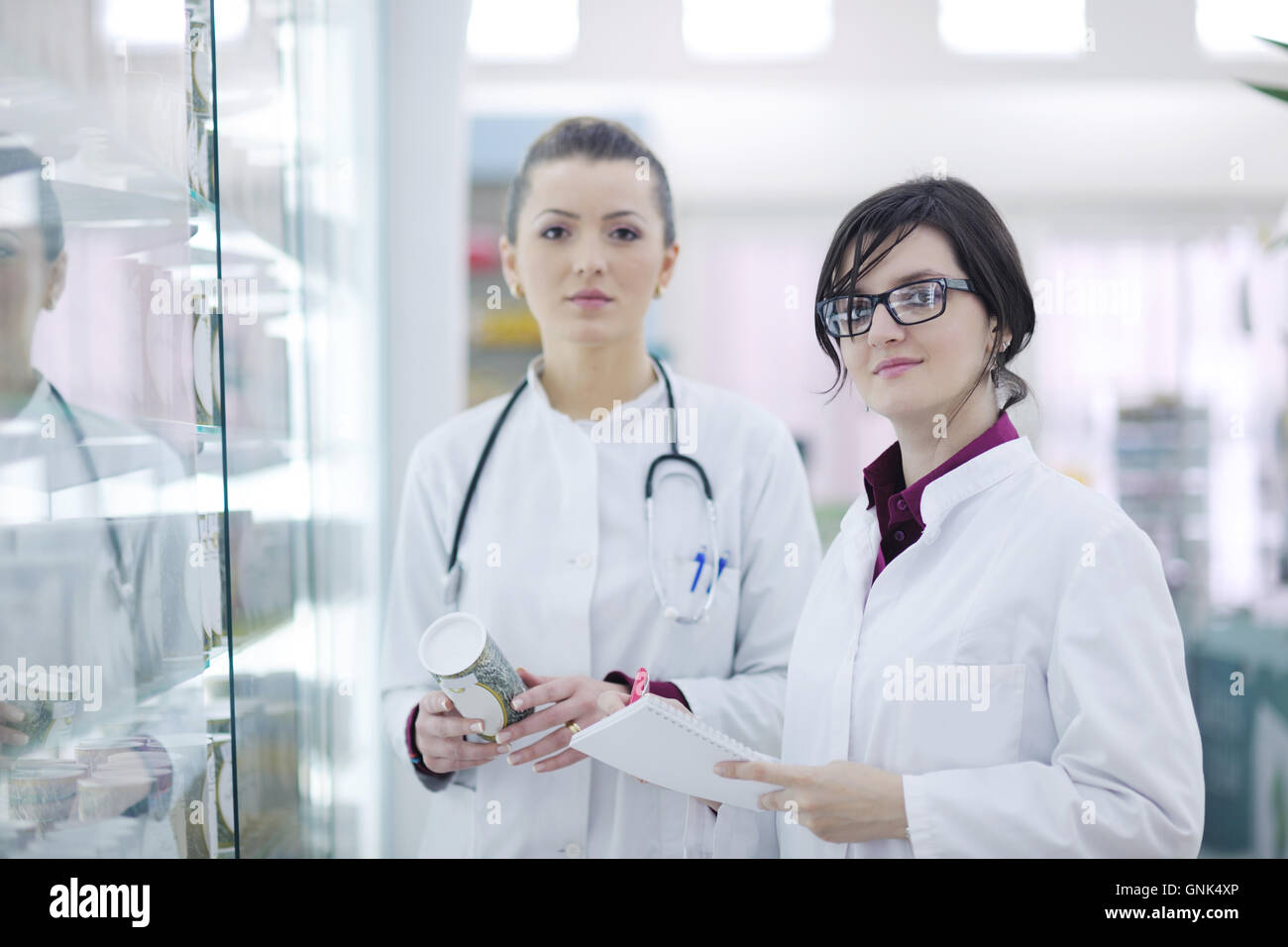 team of pharmacist chemist woman in pharmacy drugstore Stock Photo - Alamy