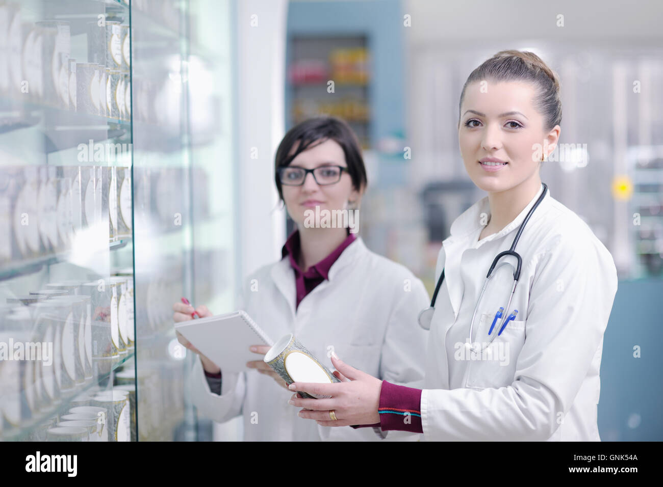 team of pharmacist chemist woman in pharmacy drugstore Stock Photo - Alamy