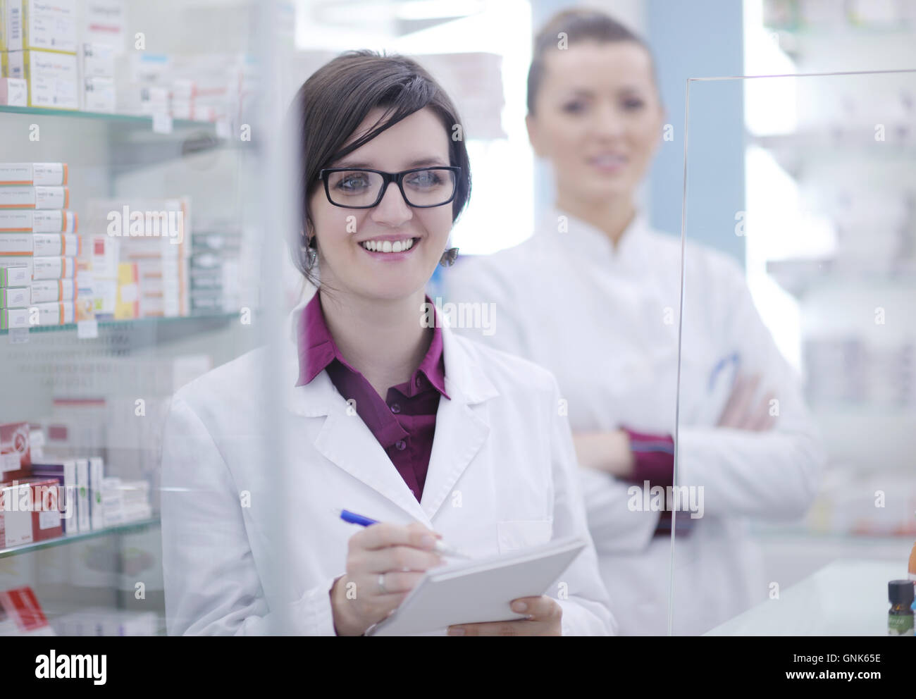team of pharmacist chemist woman in pharmacy drugstore Stock Photo - Alamy