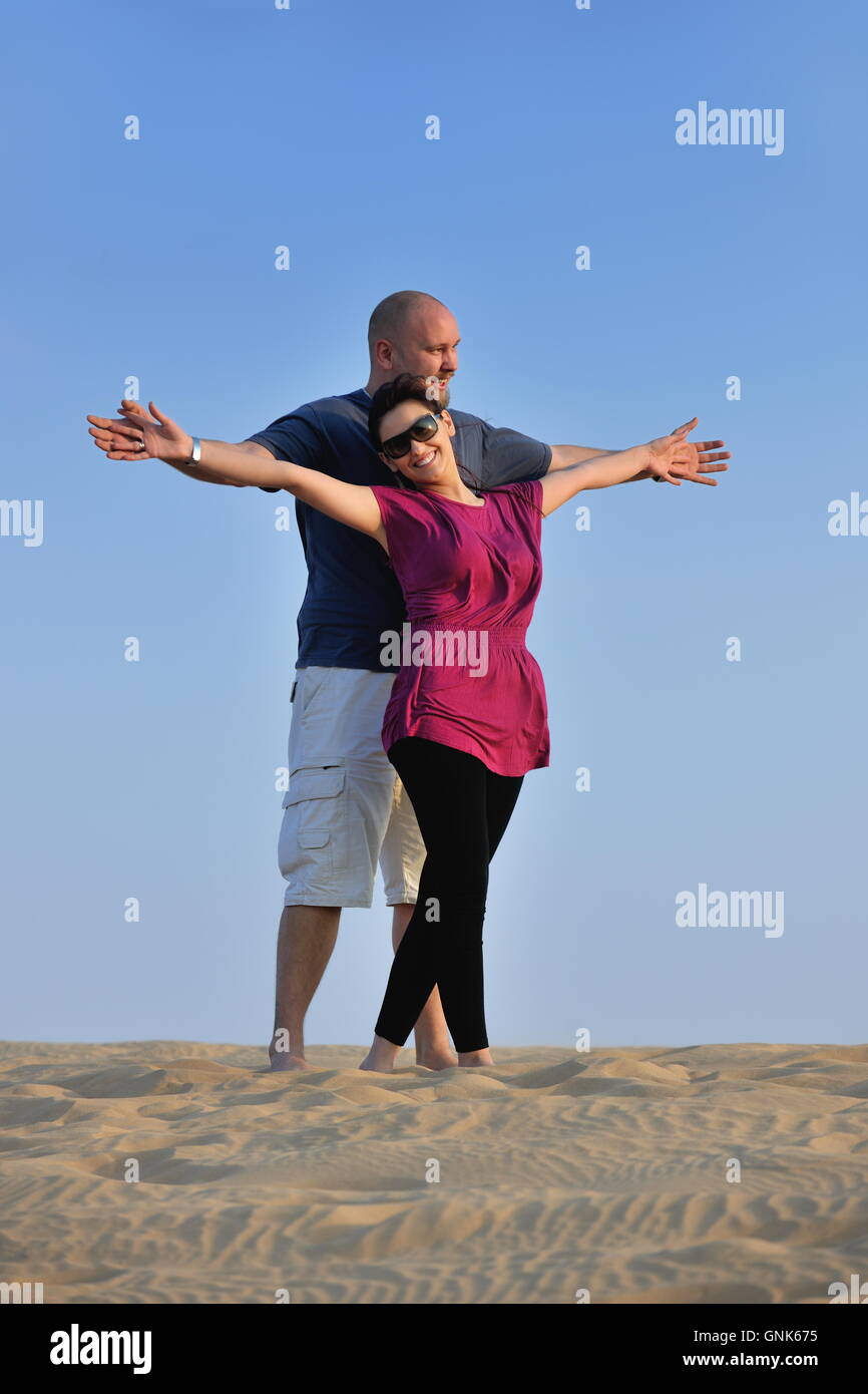 couple enjoying the sunset Stock Photo - Alamy