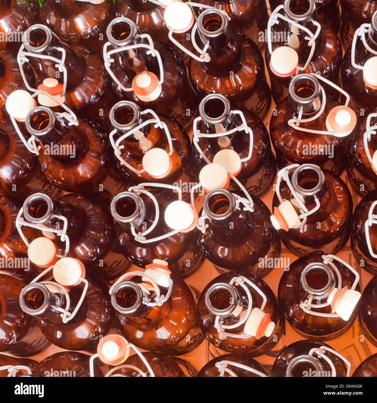 Empty brown beer bottles with open swingtop caps Stock Photo Alamy