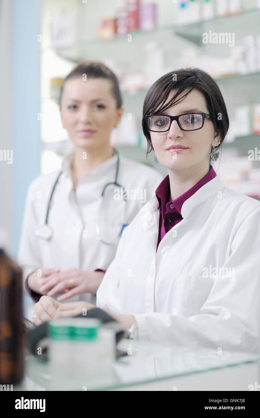 team of pharmacist chemist woman in pharmacy drugstore Stock Photo - Alamy