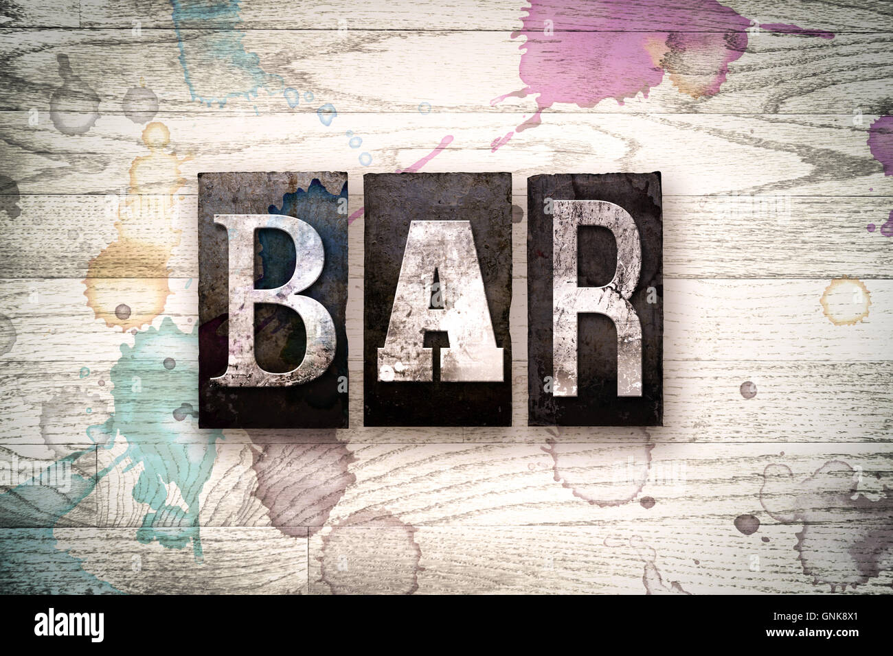 The word "BAR" written in vintage, dirty metal letterpress type on a