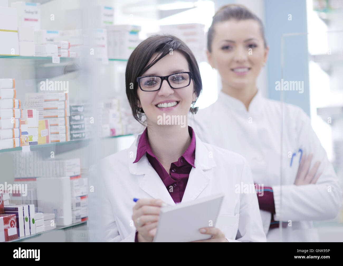 team of pharmacist chemist woman in pharmacy drugstore Stock Photo - Alamy