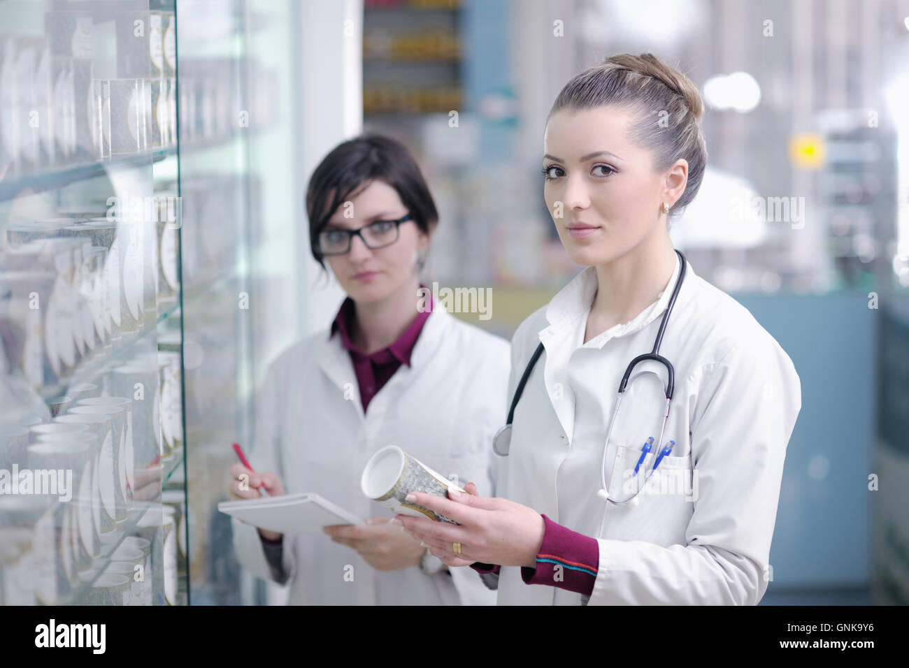 team of pharmacist chemist woman in pharmacy drugstore Stock Photo - Alamy