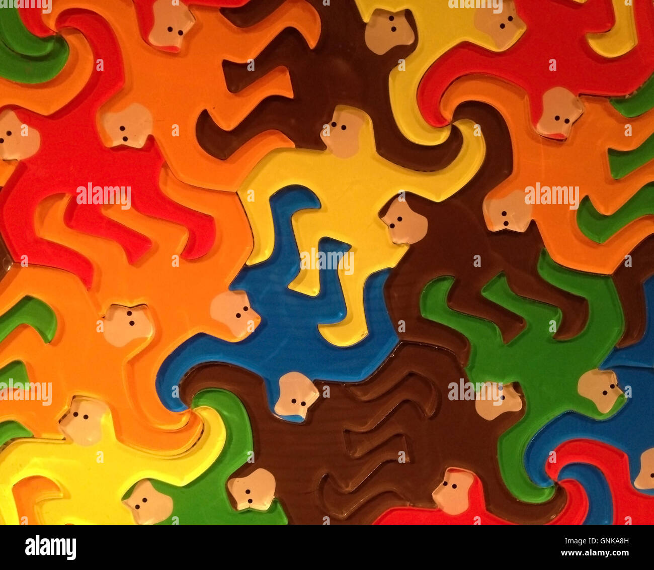 Monkey shaped tiles cover area with no gaps Stock Photo Alamy