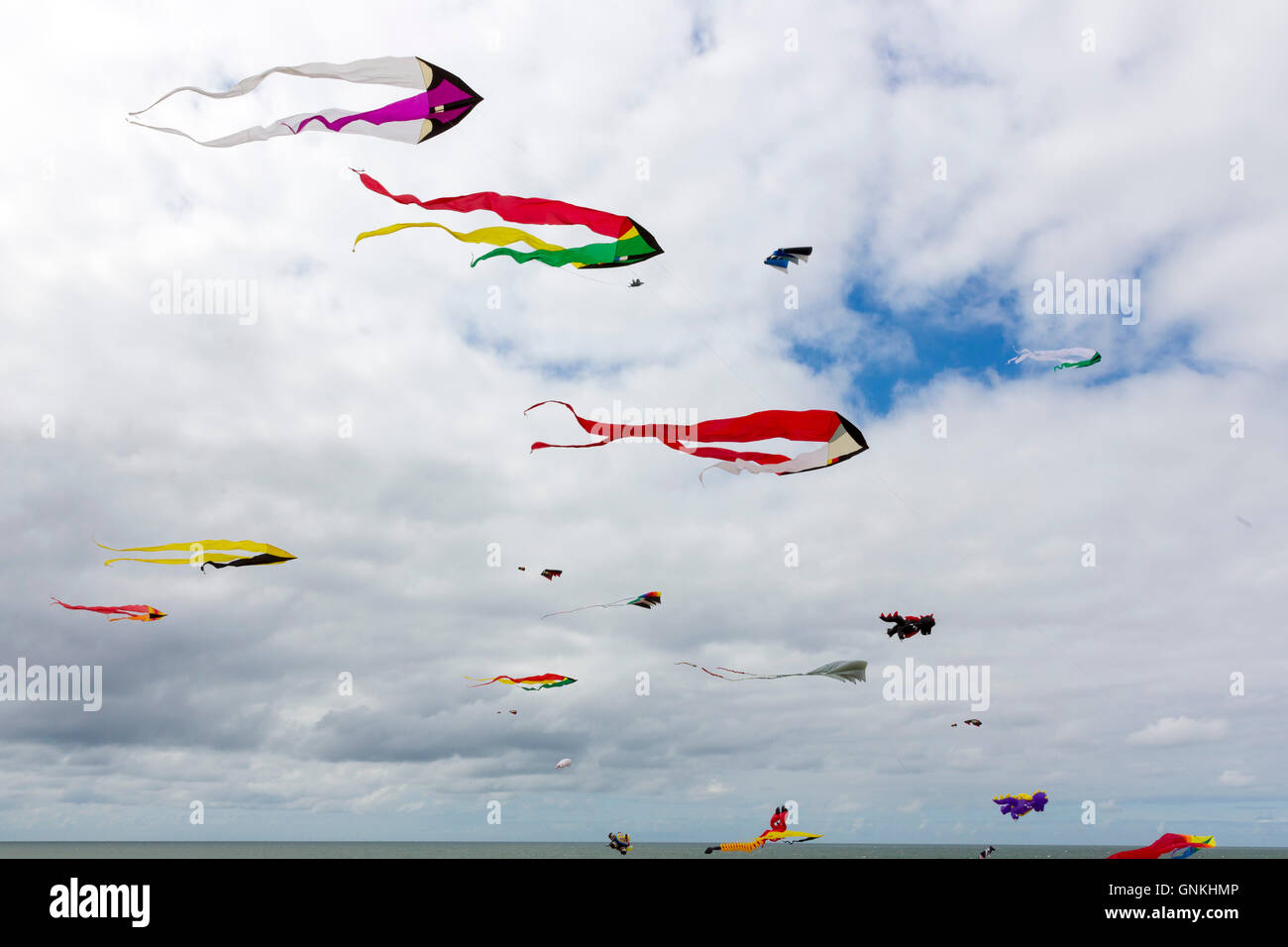 Kite festival of bright color kites in the sky above Fano Island